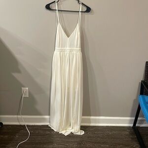 Off-white Maxi dress with side splits and undershorts.